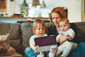 Mother Viewing a virtual tour from the comfort of her home